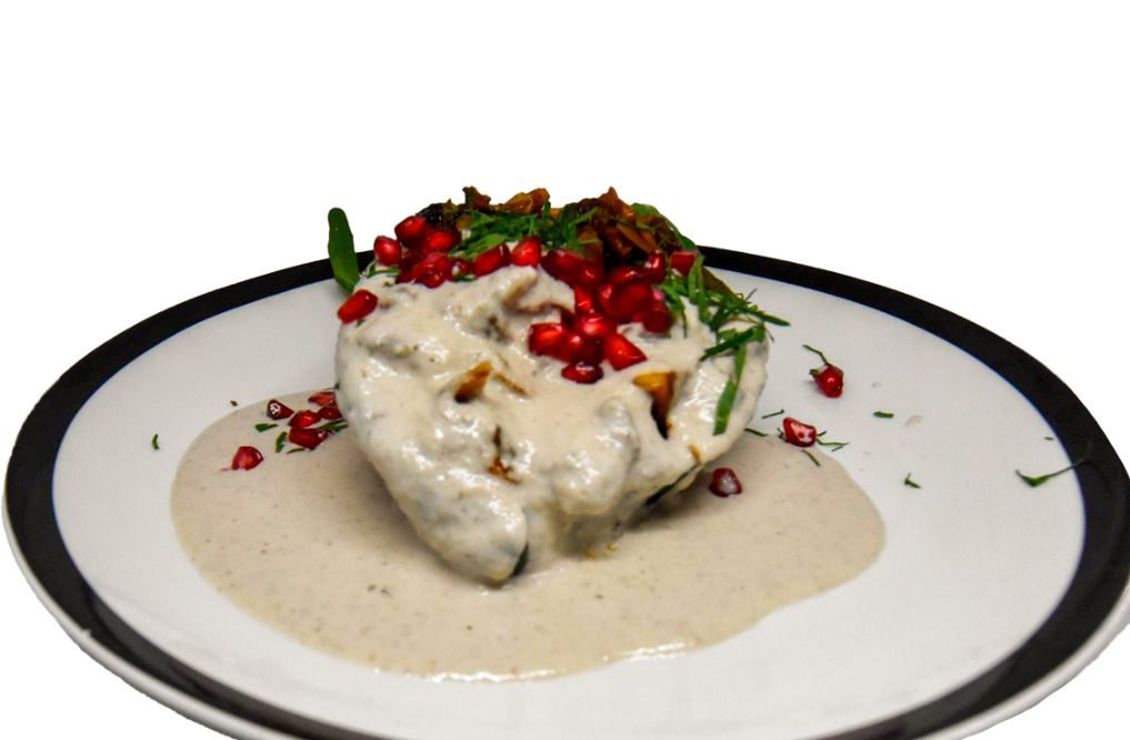Angelopolitano, chiles en nogada, comida poblana, gastronomía mexicana, tradición culinaria, chef Gerardo Quezadas, cocina tradicional, colonia Roma Norte, recetas familiares, temporada de chiles en nogada, El Grito de Independencia, moles artesanales, tacos árabes, cocina poblana en CDMX, sabores auténticos, maridaje con vino, Casa Madero V rosado, chalupas de pato, postres mexicanos, historia familiar