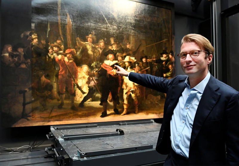 Rembrandt van Rijn, La Ronda Nocturna, Militia Company, Capitán Cocq, Lugarteniente Van Ruytenburgh, Barroco holandés, Rijksmuseum, Arcabuceros, National Geographic, El Mundo, Britanicca, Enciclopedia de Historia, RTE, Curiosidades, Acciones individuales, Fortuna, Oxidación, Restauración, Segunda Guerra Mundial, Vandalismo, Recortes, IA, Supervivencia, La Elevación de la Cruz, Boceto, Original, Pinceladas, Detalles, Reflectografías infrarrojas, Sorpresas, Legado, Eddy Warman, Eddy Warman TV, Eddy Warman Noticias, Eddy Warman de Noche, Eddy Warman Arte, 